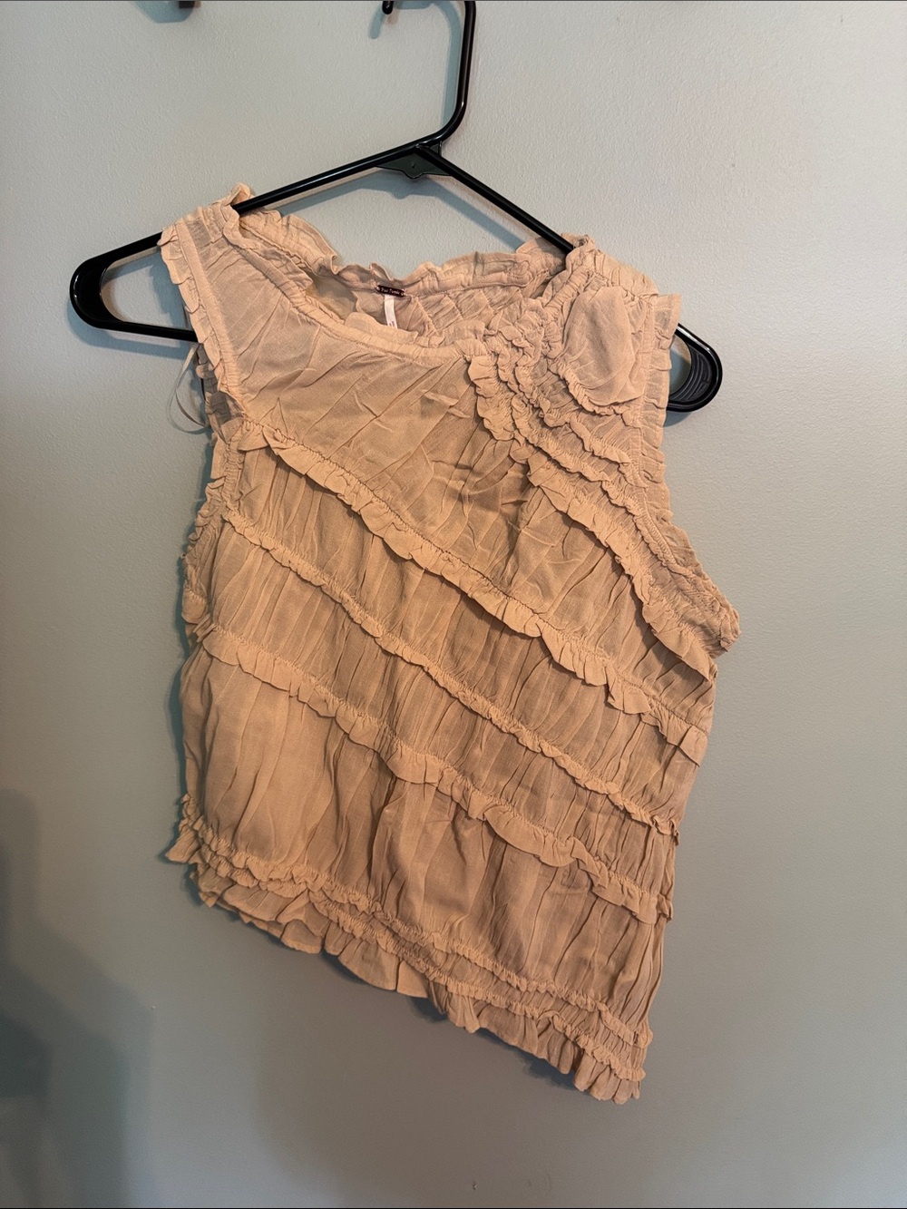 Ruffled Sleeveless Women’s Top in Cream